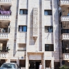 I dette hus bor Ammar og Mohammad sammen med deres fætre, kusine, onkler og tanter. De bor i lejligheden på nederste etage. Foto: William Vest-Lillesøe