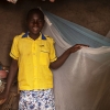 Nyirambere har myggenet over sin seng. Der er malaria-myg i området. - Foto: Emmanuel Museruka